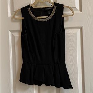Elegant Black Sleeveless Top with Silver Accents